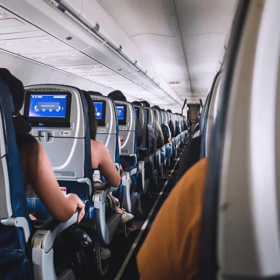 Feet on Airplane Seats